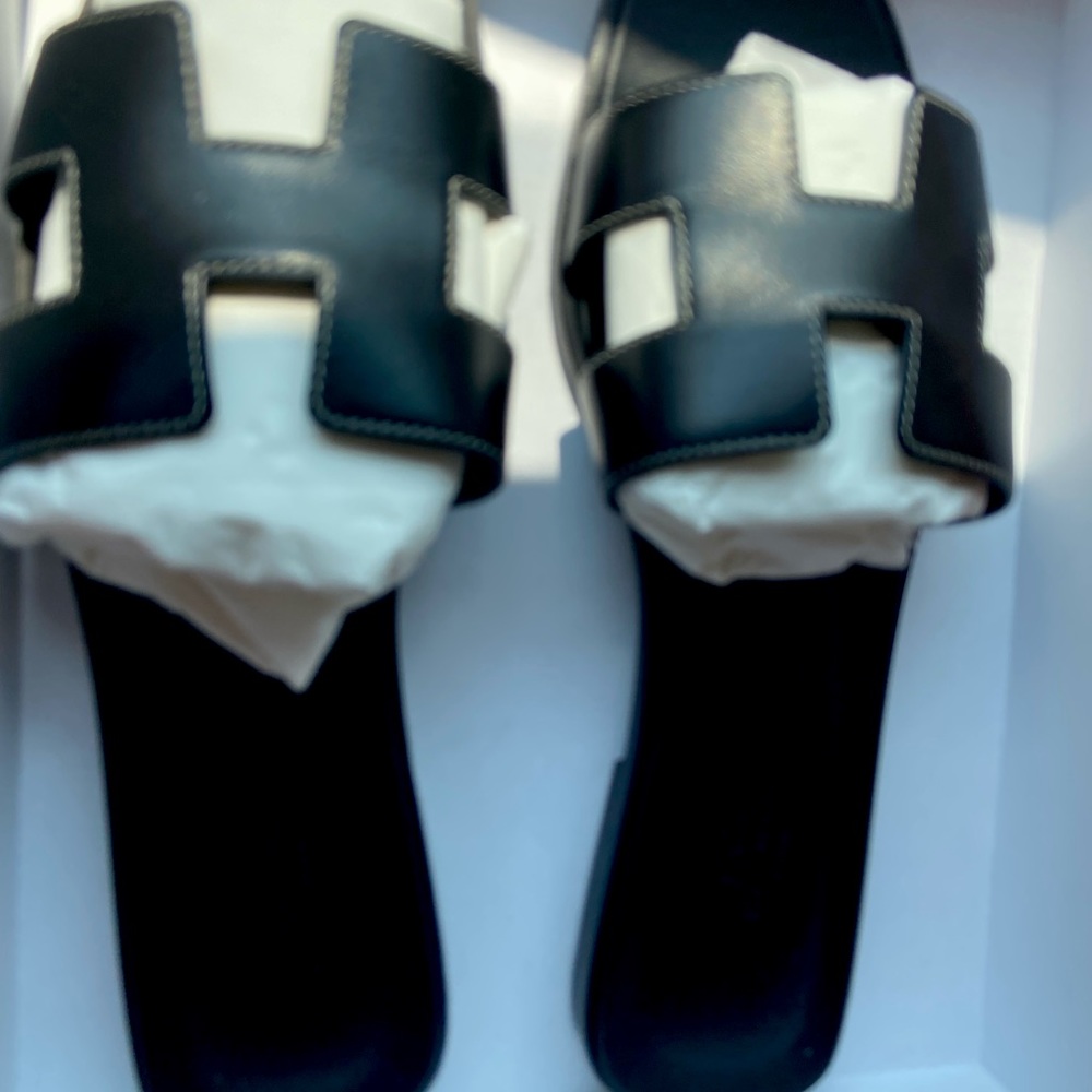 Black Hermès sandals